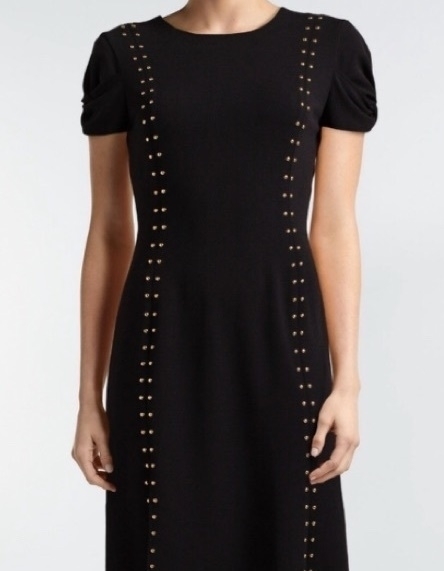 black dress with gold studs